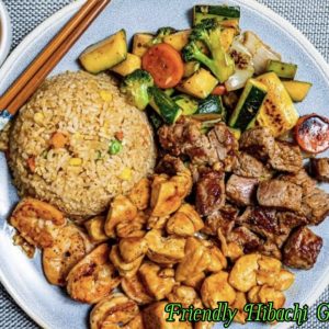Hibachi 2-entree option plate - grilled chicken, NY strip steak cubes, egg fried rice, and mixed grilled vegetables