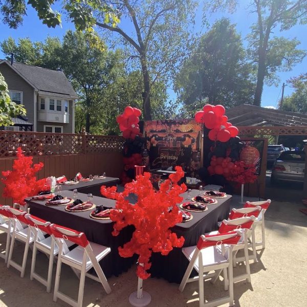 Hibachi party table setup in a sunny backyard, ready for guests in Brandon, Florida