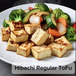 Grilled tofu cubes with grilled broccoli, zucchini, and carrots - hibachi regular tofu entree