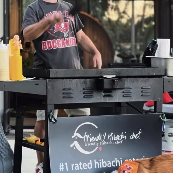 Hibachi chef grilling for guests in Pinecrest